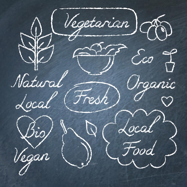 Collection of ecology food lettering and symbols on chalkboard