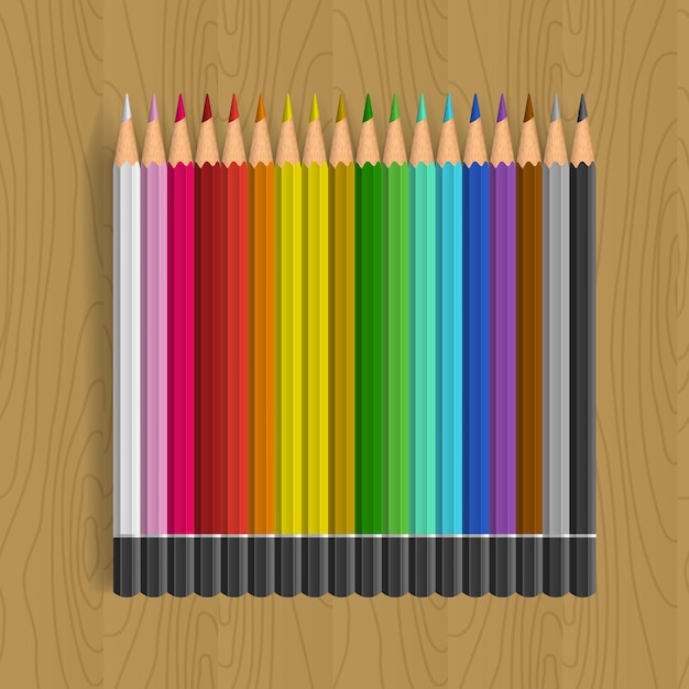 Color pencils set on woodenbackground