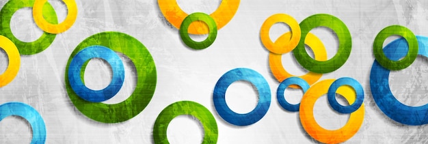 Vector colorful circle rings on grey grunge background