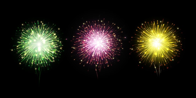 Colorful fireworks  on dark background with sparking bokeh.