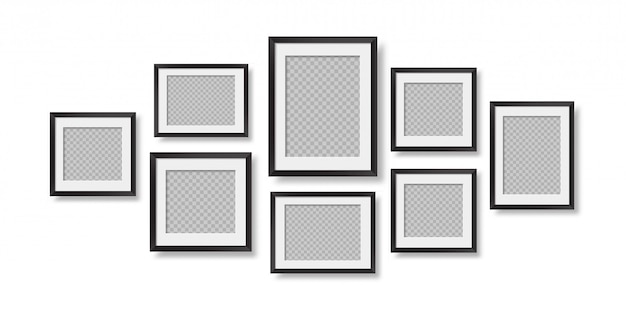 Composition of realistic black photo frames on the wall.