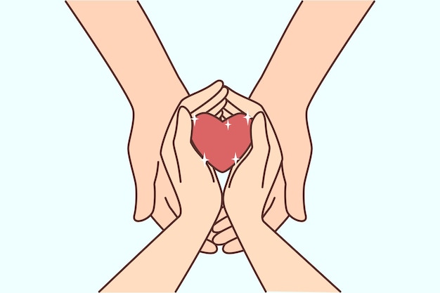 Couple hold heart in hands