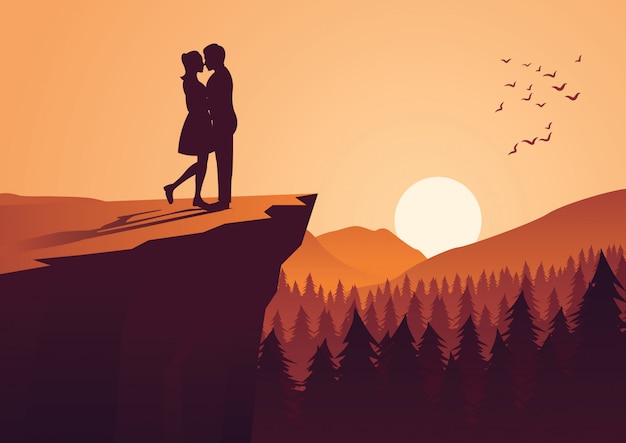 Couple hug together on cliff