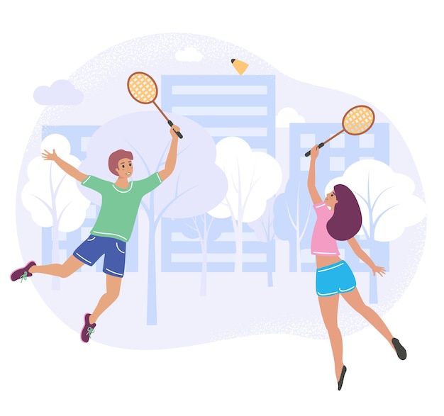 Couple playing badminton in a city park