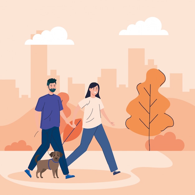 Couple walking with dog in landscape