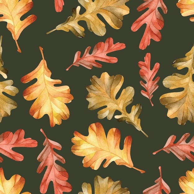 Crimson, green and yellow oak leaves watercolor seamless pattern