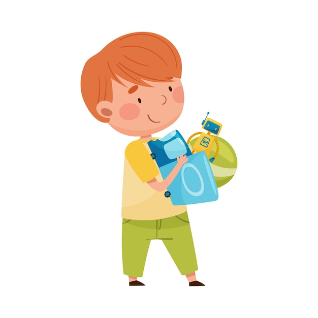 Vector cute boy carrying pile of different toys in playroom vector illustration