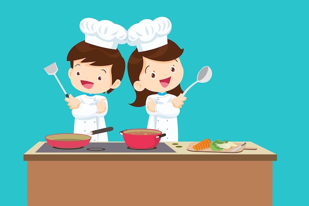 Cute Boy and Girl cooking in the kitchen happy little chef kids