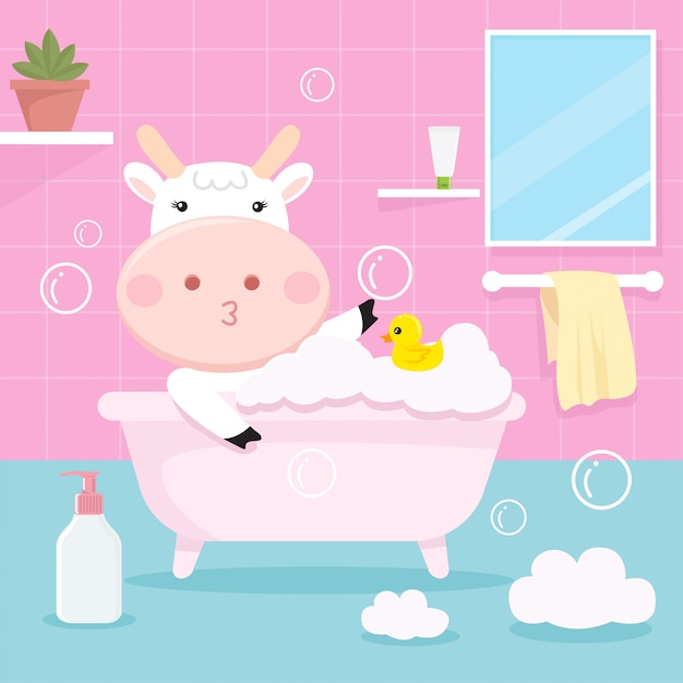 Cute cow bathing in the tub