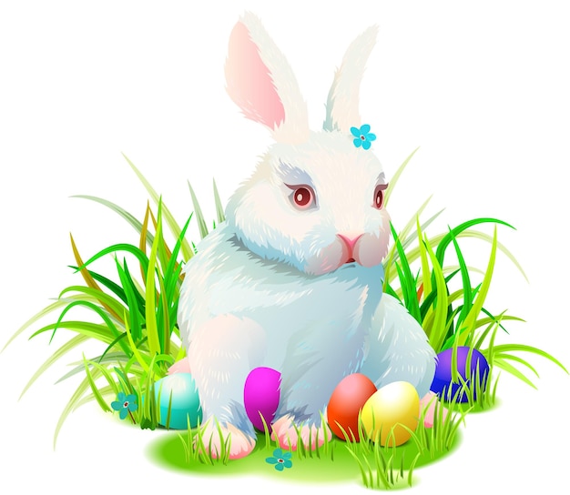 Cute easter rabbit bunny sits on green grass and painted eggs