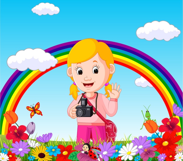 cute girl in a flower garden with rainbow