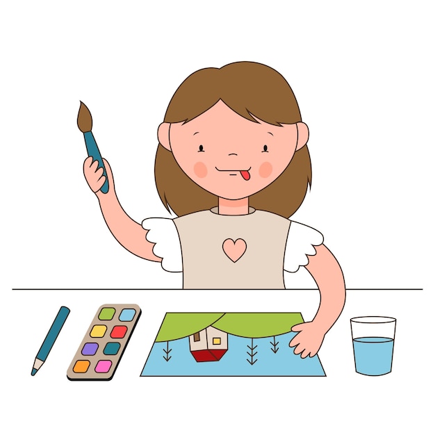 The cute girl sits at the table and draws with paints The child draws a landscape with a house