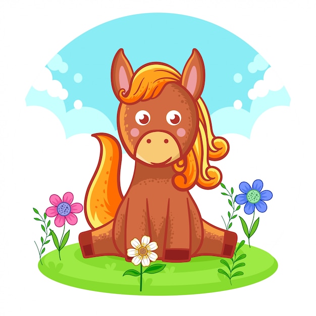 Cute horse sitting on a flower meadow. 