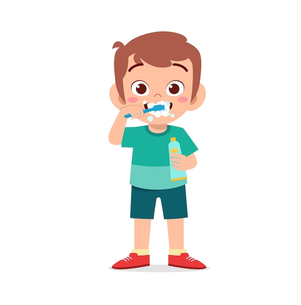 Cute little boy brushing teeth and holding toothpaste