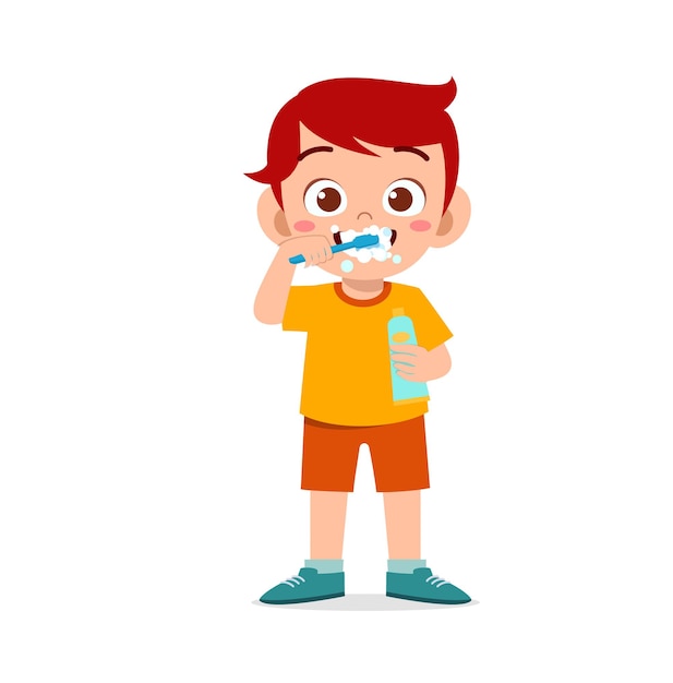 Cute little boy brushing teeth and holding toothpaste