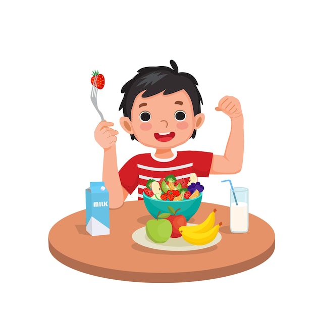 Cute little boy eating healthy fruits and vegetables showing strawberry and his strong muscle arm