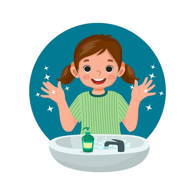 cute little girl showing her clean hands after washing hands with soap and water at the sink