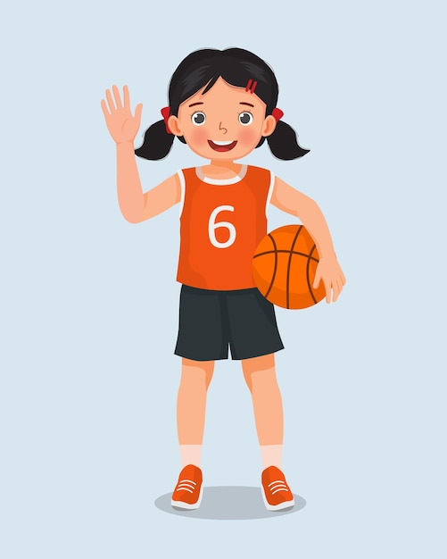 cute little girl with sportswear holding basketball standing posing with greeting and waving hand