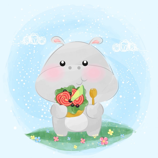 Cute little hippo eating salad