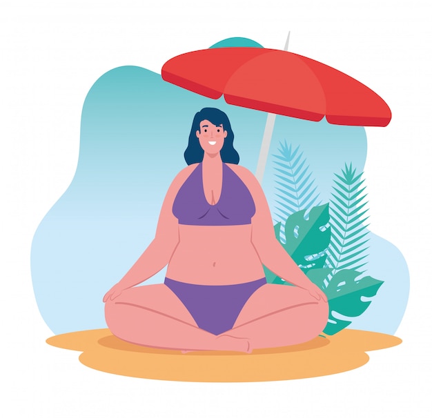 Cute plump woman in swimsuit sitting in the beach, summer vacation season