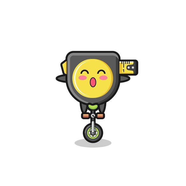 The cute tape measure character is riding a circus bike