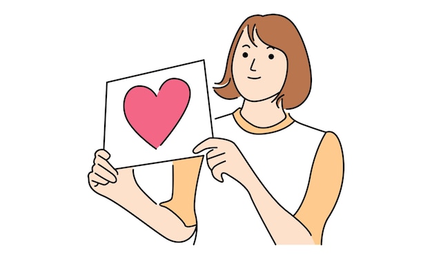 Cute woman holding love sign on paper