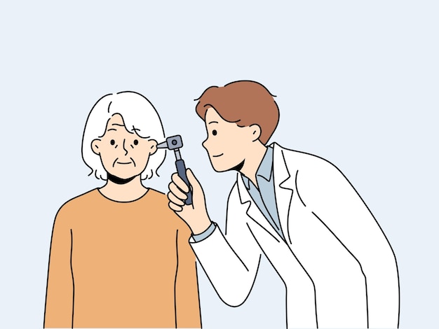 Doctor examine old patient ear