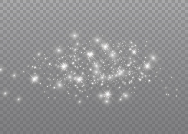 The dust sparks and golden stars shine with special light.  sparkles on a transparent background. . Sparkling magical dust particles.