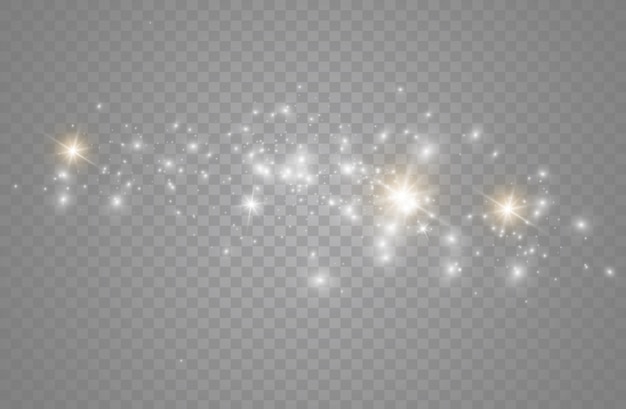 The dust sparks and golden stars shine with special light. sparkles on a transparent background. Sparkling magical dust particles.