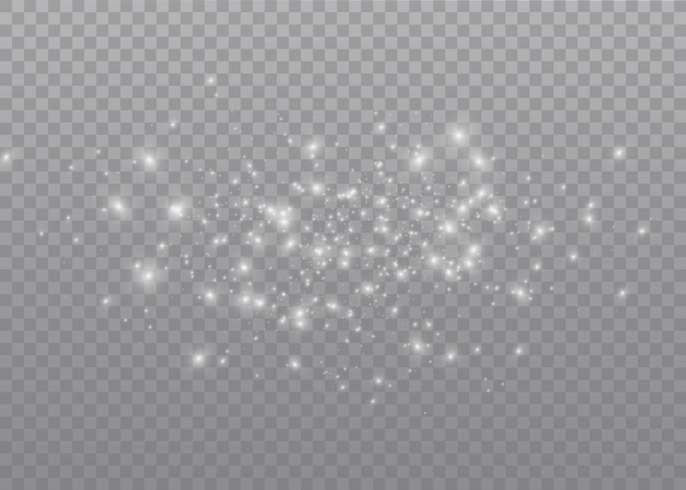 The dust sparks and golden stars shine with special light.  sparkles on a transparent background. . Sparkling magical dust particles.