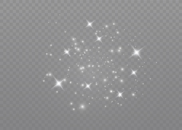 The dust sparks and golden stars shine with special light.  sparkles on a transparent background. . Sparkling magical dust particles.