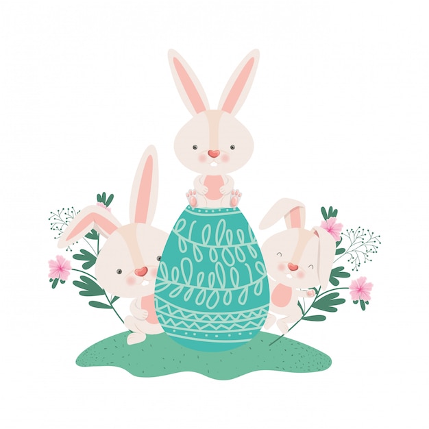 Easter rabbits with egg and flowers icon