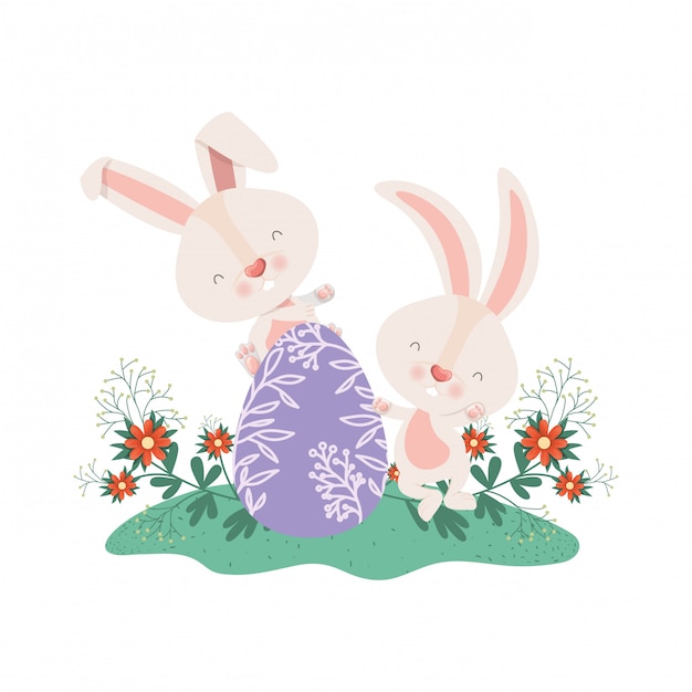 Easter rabbits with egg and flowers icon