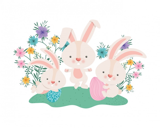 Easter rabbits with eggs and flowers icon