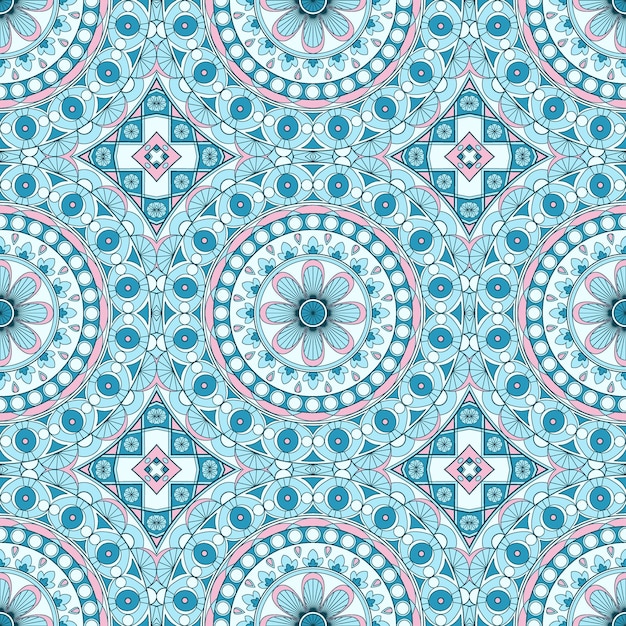 Ethnic ornamental seamless pattern in blue and pink colors