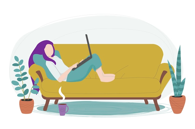 Faceless young woman using laptop while lying on a sofa