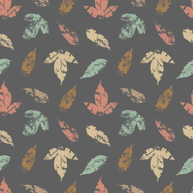 Fallen autumn leaves vector seamless pattern stamps of natural leaves paint on paper background for fabrics prints packaging and postcards