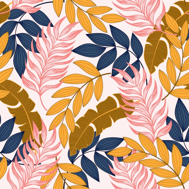 Fashionable seamless tropical pattern with bright plants and leaves on a delicate.