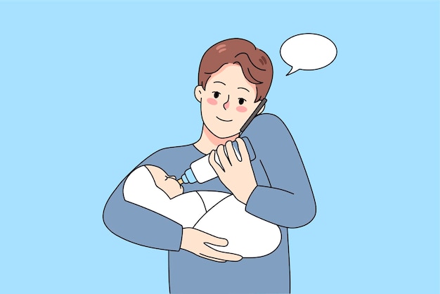 Father feeding newborn talking on phone