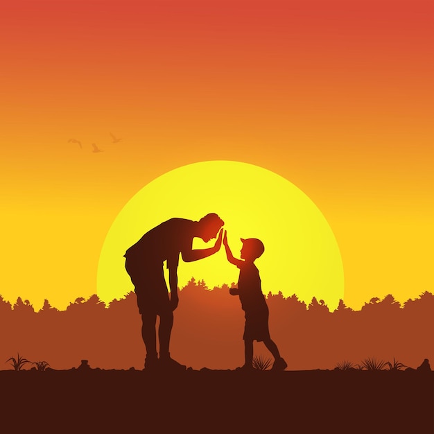 Father and son silhouette at sunset