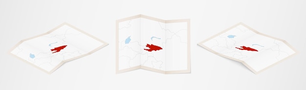 Folded map of Kyrgyzstan in three different versions.