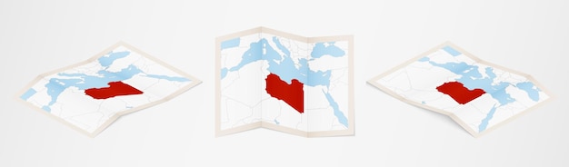 Folded map of Libya in three different versions.