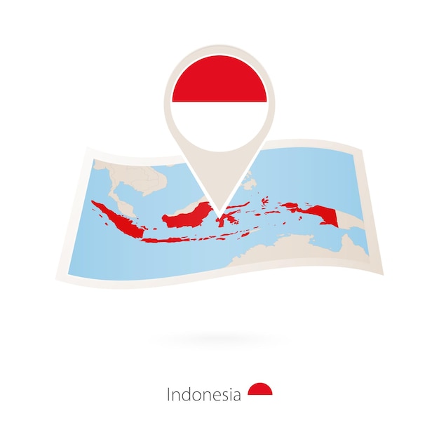 Folded paper map of Indonesia with flag pin of Indonesia