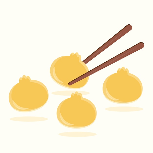 four dumplings and a pair of chopsticks