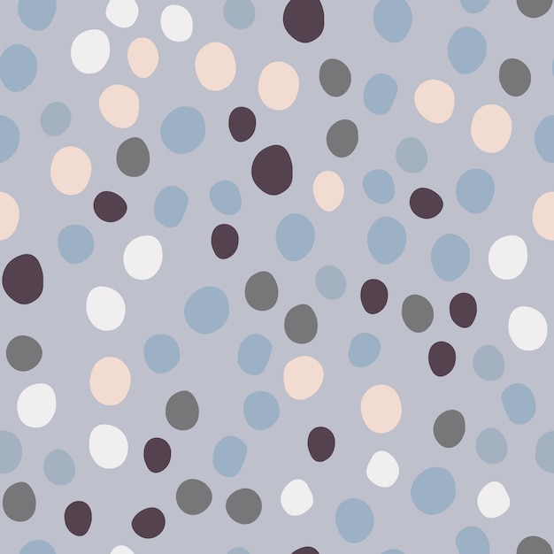 Geometric dotted wallpaper. Chaotic stones backdrop. Hand drawn pebble seamless pattern. Vector illustration