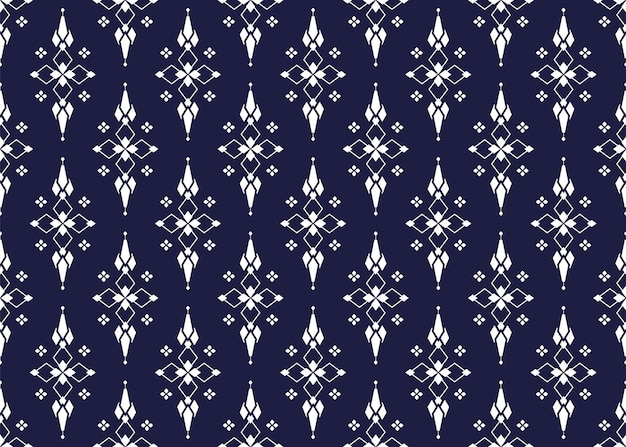 geometric and white symbol flowers on dark blue background ethnic fabric seamless pattern design