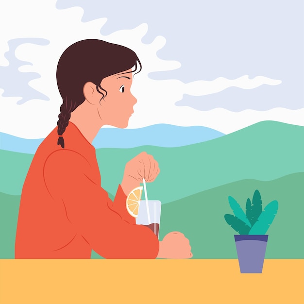 The girl drinks a drink at the table Mountain landscape against the background of white clouds