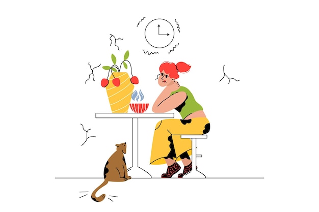 The girl is sitting at the table Bored look upset woman thoughtful A cat looks at a woman a pet