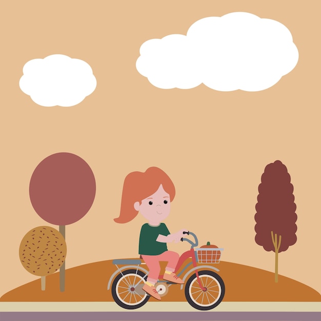 A girl rides a bicycle.Autumn landscape on the background.Carrying a pumpkin in a basket