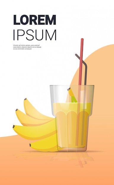 glass of fresh banana juice with straw and fruits vertical copy space